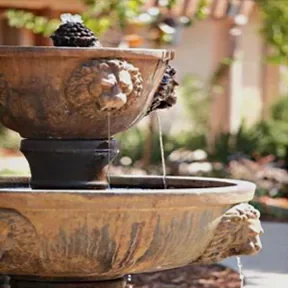 Holmby Hills lion-head fountain courtyard