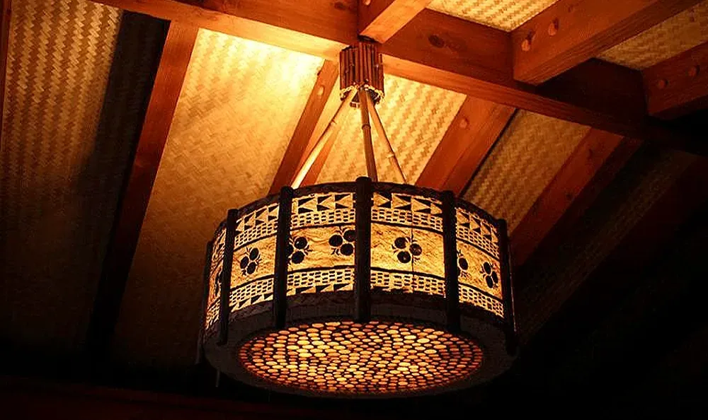 Sunset Magazine feature garden: lantern beneath the redwood and thatch ceiling